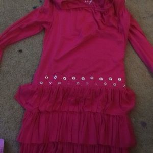 A pink longsleeve dress with ruffles